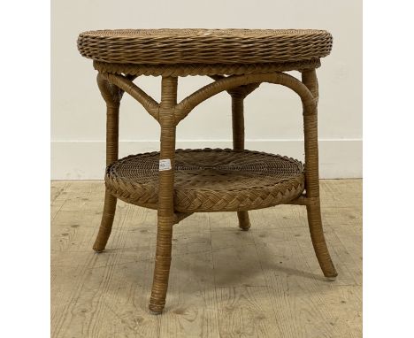 A Vintage rattan two tier circular lamp table. H55cm, D57cm.