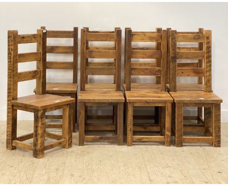 A set of eight rustic ladder back dining chairs. H112cm