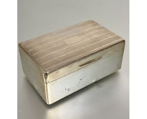 A Birmingham silver rectangular cigarette box with engine turned top with cedar lined interior, ( H x 6 cm x L x14 cm x W x 8