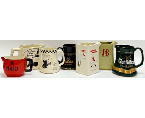 A mixed group of Whisky advertising ceramic water jugs comprising Johnnie Walker Scotch Whisky, J &amp; B Scotch Whisky, Blac