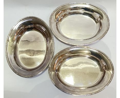 A set of three Elkington Plate oval serving dishes/bowls with reed and tie border modelled as stars (design probably for Whit