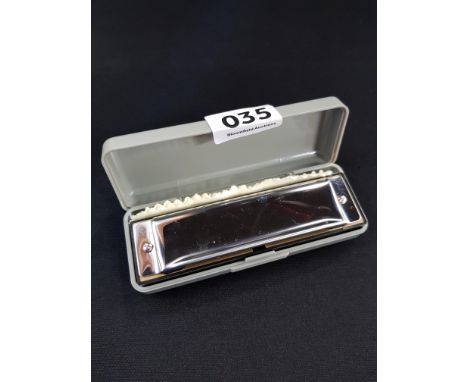 HARMONICA AND CASE 