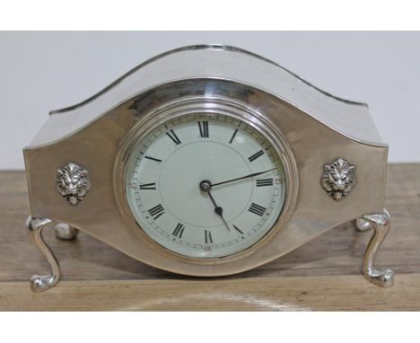 A silver plated Georgian style mantel clock, length 20cm.