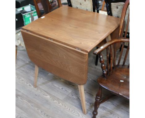 An Ercol light elm and beech drop leaf table, length 74cm, depth 66cm & height 71cm.