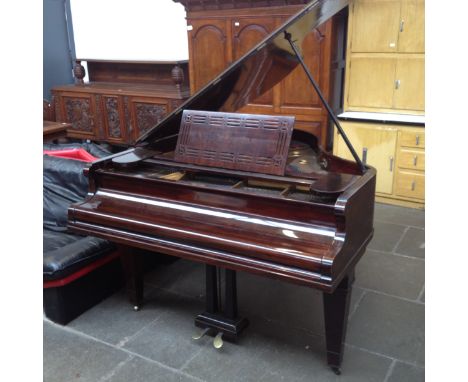 R Gors & Kallman baby grand piano.