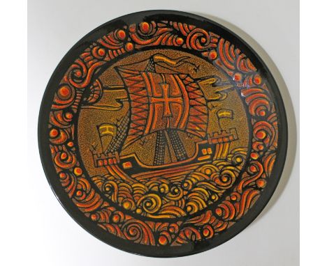 A Poole Aegean pottery charger by Diana Davis, decorated with a galleon at sea, diam. 41cm. Condition - appears free from any