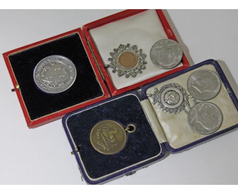 A mixed lot comprising two hallmarked silver fobs, a The Kings regiment boxing medal, 1902 County of Worcester medal and thre