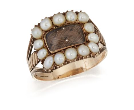 A GEORGIAN SPLIT PEARL AND HAIRWORK MOURNING RING, a glazed rectangular reserve containing plaited hair within a border of sp