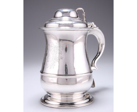 A GEORGE II SILVER TANKARD,&nbsp;by John Payne, London 1752, of baluster form with graduated and banded domed cover, hinged w
