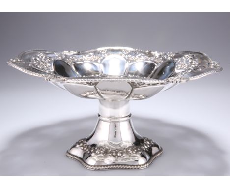 AN EDWARD VII SILVER PEDESTAL BOWL,&nbsp;by&nbsp;S Glass, Birmingham 1906, the shaped circular dish pierced and chased with f