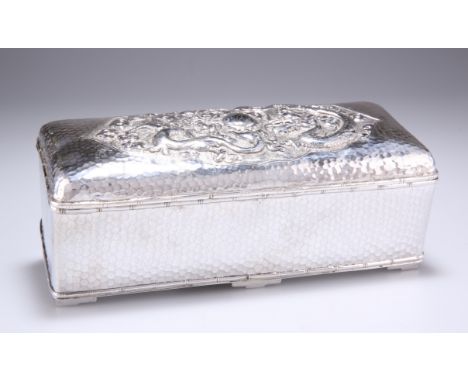 A CHINESE SILVER BOX, by Tu Mao Xing, Jiujiang, late 19th/early 20th Century, rectangular, the hinged domed lid repoussé with