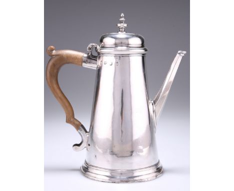 A GEORGE II SILVER COFFEE POT,&nbsp;by John Eckford II, London 1729, of plain tapering form with reeded foot and faceted spou