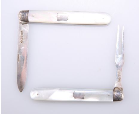 A VICTORIAN SILVER AND MOTHER-OF-PEARL FOLDING FRUIT KNIFE AND FORK,&nbsp;maker WM, Sheffield 1883, each with foliate engrave