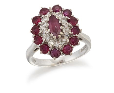 AN 18 CARAT WHITE GOLD RUBY AND DIAMOND CLUSTER RING, a marquise-cut ruby in a claw setting within a border of eight-cut diam