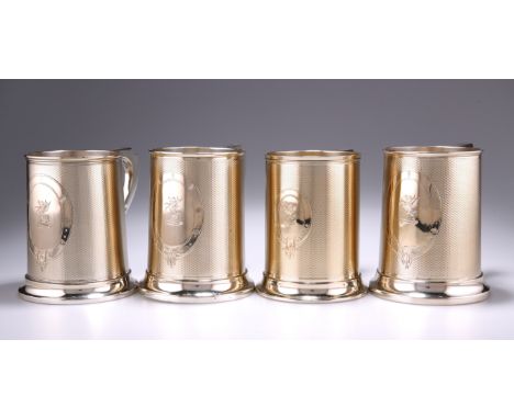 A HARLEQUIN SET OF FOUR VICTORIAN SILVER-GILT PINT MUGS, the first pair by&nbsp;Edward Hutton, London 1888, the second pair b