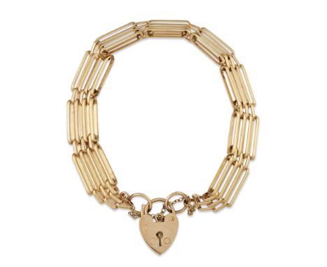 A 9 CARAT GOLD GATE LINK BRACELET, four rows of long bar links alternating with three rows of short bar links, to a padlock c
