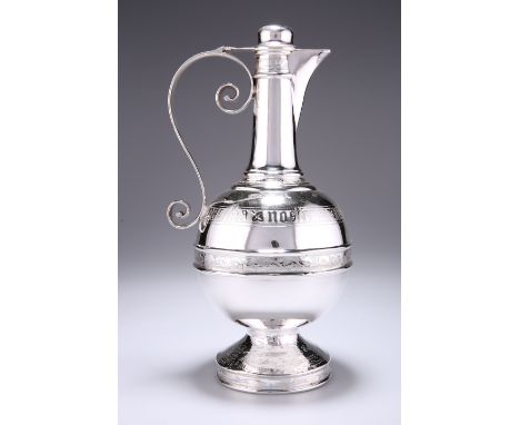 A VICTORIAN SILVER COMMUNION FLAGON, by Henry Wilkinson & Co, Sheffield 1879, the bulbous body with the inscription 'Pascha n