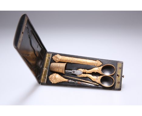 A 19TH CENTURY FRENCH ETUI, the ebony case of tapering rectangular form, containing a gold needle case, gold-handled bodkin, 