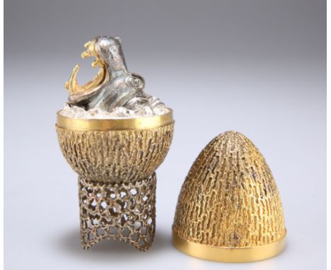 AN ELIZABETH II SILVER-GILT LIMITED EDITION SURPRISE EGG, by Stuart Devlin, London 1973, no. 12,&nbsp;ovoid form with texture