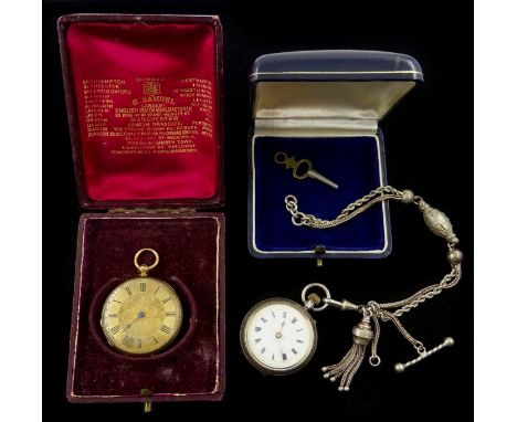 18ct gold ladies pocket watch, key wound, stamped 'FM 18K', engraved 'Orr &amp; Co Bangalore' and a silver ladies pocket watc