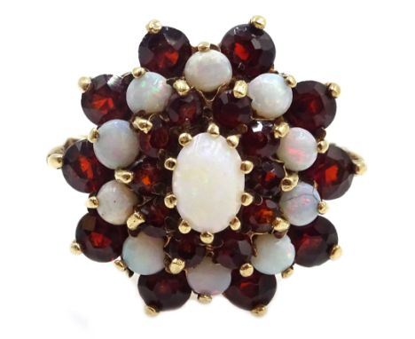 9ct gold garnet and opal cluster ring, hallmarked Condition Report & Further Details Approx 4.5gm, size OClick here for furth