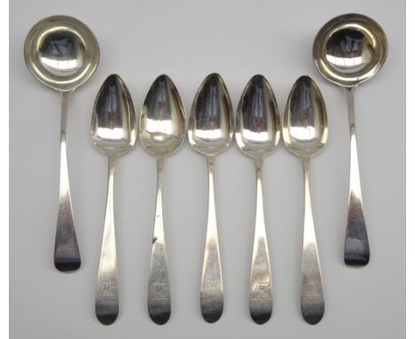 Five George IV Irish silver Celtic Point pattern dessert spoons engraved with a crest Dublin 1827, maker JB and a pair of Geo