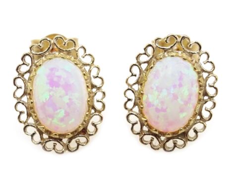 Pair of 9ct gold opal filigree stud earrings, stamped 375 Condition Report & Further Details Click here for further images, c