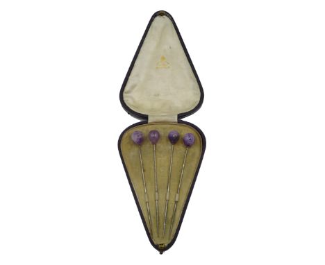Set of four amethyst and sapphire hat pins, retailed by J. G. Vickery Regent Street, London, in original case Condition Repor