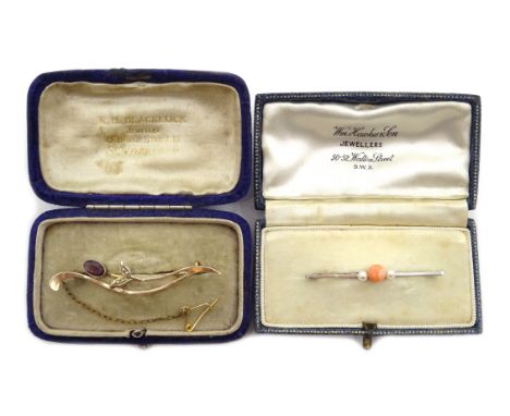 White gold coral and pearl bar brooch and amethyst and seed pearl bar brooch, both stamped 9ct and boxed Condition Report & F