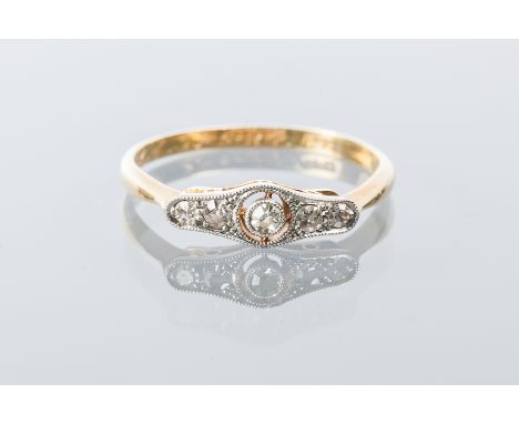 EARLY TWENTIETH CENTURY DIAMOND RING
with a central brilliant cut diamond in a pierced setting flanked by four other brillian
