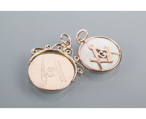 TWO MASONIC PENDANTS
one set with mother of pearl, overlaid with the compass symbol, the other of rotating design, partially 