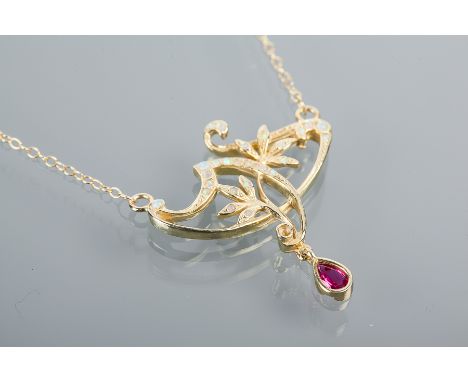 ART NOUVEAU STYLE SYNTHETIC OPAL AND RED GEM PENDANT NECKLACE
of floral openwork form, set with cabochon synthetic opals and 