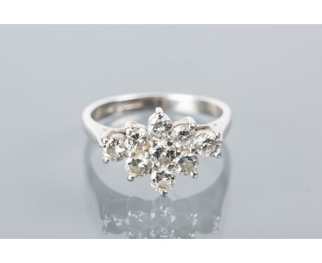 DIAMOND CLUSTER RING
with a boat shaped cluster of brilliant cut diamonds totalling approximately 0.90 carats, in platinum, s