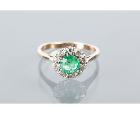 EMERALD AND DIAMOND CLUSTER RING
the central round emerald approximately 0.49 carats, surrounded by brilliant cut diamonds, m