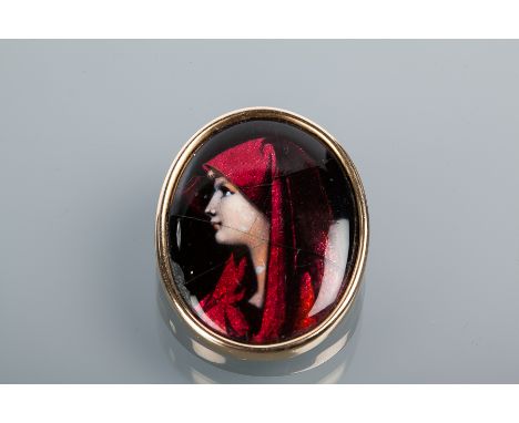 LIMOGES ENAMELLED PORTRAIT BROOCH
of oval form, depicting a woman wearing red in profile, in an unmarked mount