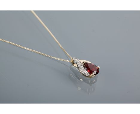 NINE CARAT GARNET AND DIAMOND PENDANT ON CHAIN
the pendant with central pear cut garnet 3.2mm long, in an illusion set diamon