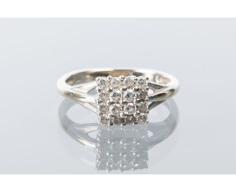 DIAMOND DRESS RING
the square bezel set with sixteen brilliant cut diamonds totalling approximately 0.38 carats, on trifurcat