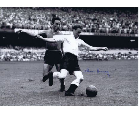 TOM FINNEY 1950: Autographed 16 x 12 photo, depicting TOM FINNEY in full length action for England as he holds off defender F