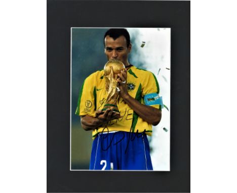 Football Cafu signed 16x12 mounted colour photo pictured with the World Cup trophy after Brazils secured their fifth win in 2