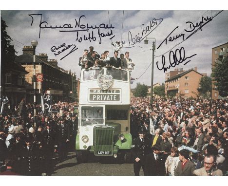 TOTTENHAM 1961: Autographed cutting measuring 28 x 21 cms, depicting Tottenham players parading the FA Cup and the First Divi