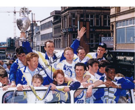 GARY McALLISTER 1992: Autographed 16 x 12 photo, depicting Leeds United's GARY McALLISTER holding aloft the First Division tr