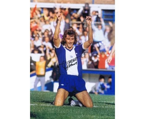 TREVOR FRANCIS 1975: Autographed 16 x 12 photo, depicting Birmingham City striker TREVOR FRANCIS celebrating on his knees aft