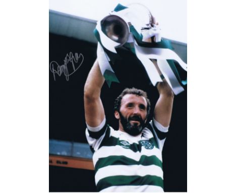 DANNY McGRAIN 1982: Autographed 16 x 12 photo, depicting Celtic captain DANNY McGRAIN holding aloft the League Championship t