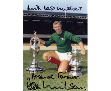 BOB WILSON 1971: Autographed 7 x 5 photo, depicting Arsenal goalkeeper BOB WILSON posing with the FA Cup and the First Divisi