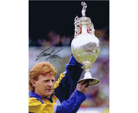 GORDON STRACHAN 1992: Autographed 16 x 12 photo, depicting Leeds United captain GORDON STRACHAN holding aloft the First Divis