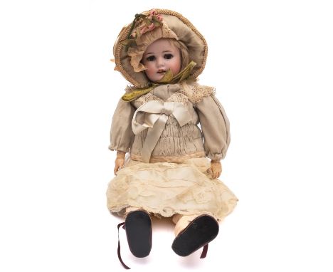 A Max Handwerck Bebe Elite Bisque Head Doll,  applied blonde wig , brown glass sleeping eyes, open mouth with teeth and paint