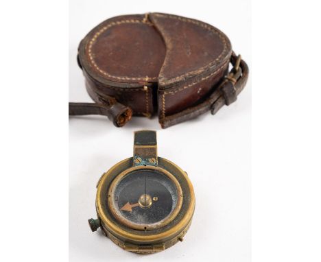 A WWI period brass vernier compass dated 1917 to back of case, in a Leatheries Ltd  case dated en suite. 