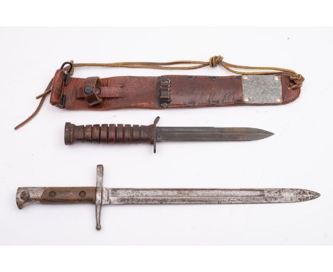 An Italian 1891 pattern bayonet stamped 'B142 to hilt with two piece wooden grip, together with a USA M3 pattern fighting kni