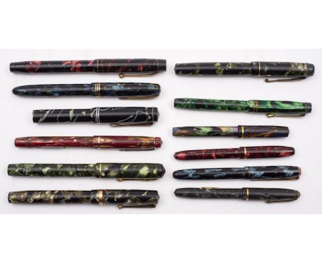 Mabie, Todd & Co Ltd, Onoto and others. A group of eight vintage marbled fountain pens, together with three Conway Stuart 550