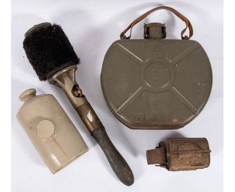 An artillery gun chamber brush, together with a brown leather gun case stamped with broad arrow and numbered '117',  a  Sandi